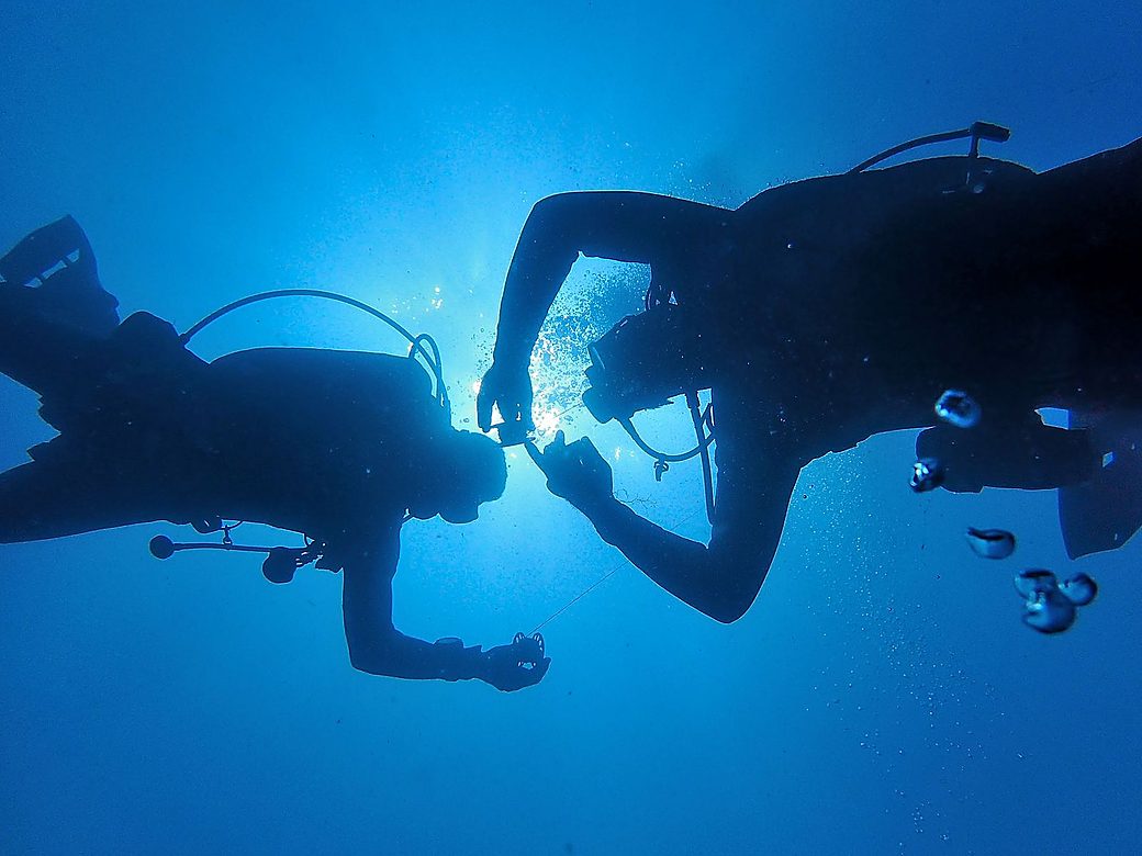 Diver practising skills in shallow, clear water